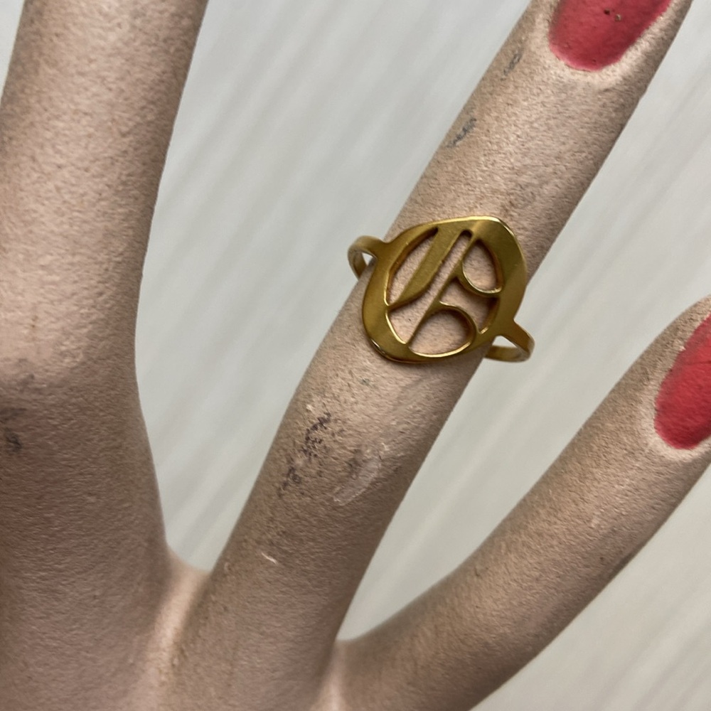 Old English Letter adjustable ring . Gold tone.